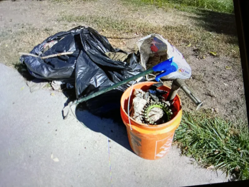 HEAVY muddy bags of trash